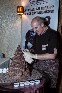  Гостей порадовала компания «Конфаэль» своим  «шоколадным искусством» - огромной шоколадной елкой, которую мастерски вырезал специалист фабрики 